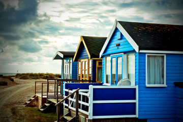 Beach huts at Hengistbury Head near Bournemouth in Dorset, England