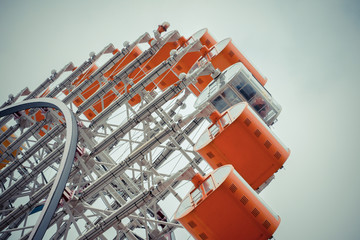 Ferris Wheel Over Blue Sky Background