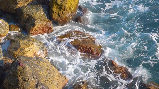 Occean waves hitting rocks in slow motion 180fps