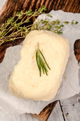 butter on rustic wooden background. Background image. Copy space