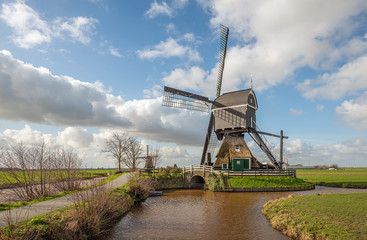 Windmill Kleine Tiendweg in the Dutch village of Streefkerk, municipality of Molenwaard, Alblasserwaard, South Holland. It is a hollow post mill built before the year 1751 and in operation until 1951.