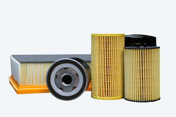 Group of new filters of a modern car isolated on white background. Concept service and repair of a modern car, sale and storage of spare parts. 