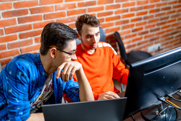 Software engineers working on project and programming in company. Website design. Brainstorming...