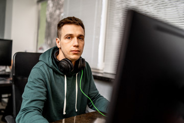 Developing programming and coding technologies. Website design. Programmer working in a software...