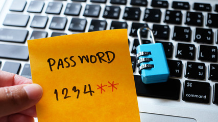 'Password' message concept written post it on laptop keyboard	