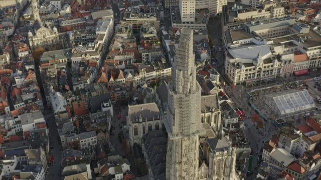 Antwerp Belgium Aerial v33 Birdseye flying around Cathedral of Our Lady Antwerp downtown at sunset with cityscape views - November 2019