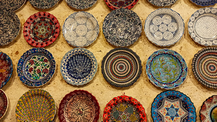Hittite wine vessels, colorful ceramic vases and porcelain bowls in a underground cave atelier in Avanos in Cappadocia. Turkish traditional ceramic handycrafts in a local pottery shop in Cappadocia