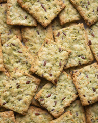 Healthy Snack from Wholegrain Rye Crispbread Crackers with spinach and flaxseed and olive oil
