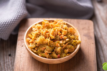 Pickled chili sauce is in a bowl. It's a kind of Korean kimchi. It's served with rice in Asia or China