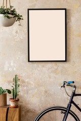 Modern composition of living room interior with black mock up poster frame, wooden cube, plant,...