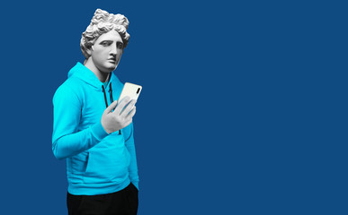 Modern art collage. Concept portrait of a man  holding mobile smartphone using app texting sms...