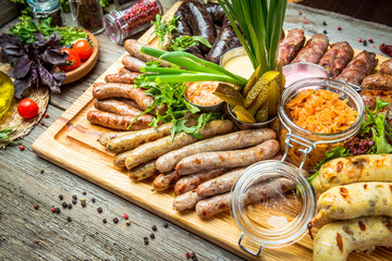 a set of different sausages, grilled on plate