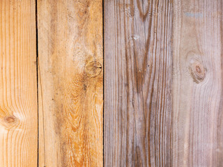 Wheatered old vertical pine wood boards close up shot, image for background.