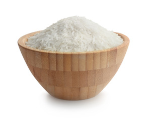 Rice in a wooden bowl isolated on white