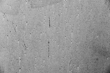 Texture of a metal wall with cracks and scratches which can be used as a background