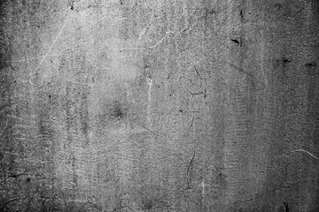 Texture of a metal wall with cracks and scratches which can be used as a background