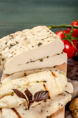 Food for wine delicious and romantic. The concept of eco products. Organic farm dairy products, cheeses. Parmesan, feta, goat cheese. Background image. Copy space