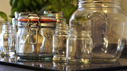 Fototapeta na wymiar empty glass jars for storing food in the kitchen