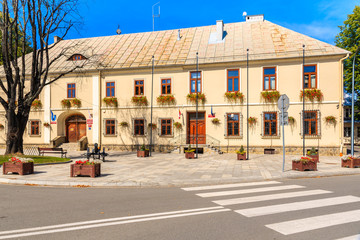 STARY SACZ, POLAND - SEP 15, 2019: Town hall building in old town of Nowy Sacz on sunny summer day,...