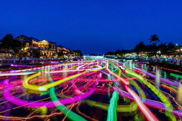 Light trails of passenger boats at Hoi An, Vietnam