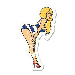 distressed sticker tattoo of a pinup girl in swimming costume