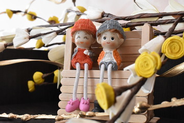 Cute couple dolls sitting in their own fantasy world
