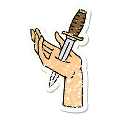 traditional distressed sticker tattoo of a dagger in the hand