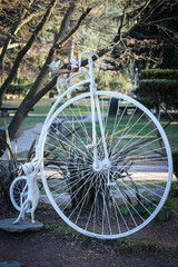 Fototapeta na wymiar ancient white bicycle in turin