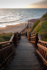 Obraz premium wooden bridge on the beach