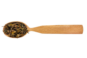 Dried Bidens in a wooden spoon on a white background. Phytotherapy and disease prevention. Herbal...