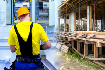 Electrician at work. A man collects electrical wiring. Construction works. Electrician mounts electrical panel. Electro shield. Engineering work on the construction of the house.