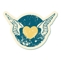 distressed sticker tattoo style icon of a heart with wings