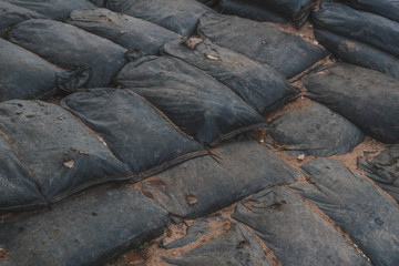 Sandbag for protecting the enemy from invading front line. Sandbag in border area used in warzone. Military controlled area 