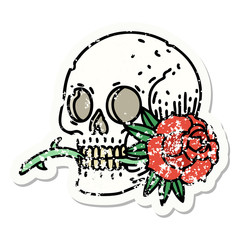 traditional distressed sticker tattoo of a skull and rose