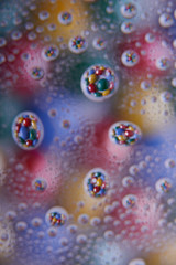 Abstract background with colorful gradient colors. Oil drops in water abstract psychedelic pattern image.