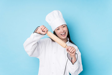 Young japanese chef woman cooking