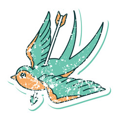 distressed sticker tattoo style icon of a swallow