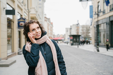 Woman using smartphone outdoors