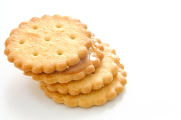 Stack of sweetmeal digestive biscuits isolated on white background