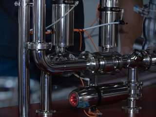 Equipment, cables and pipelines located inside an industrial enterprise that produces milk
