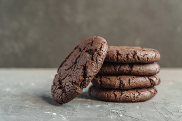 stuck of chocolate brownie cookies  on dark concrete background