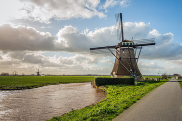 Windmill Achtkante Molen is a wooden octagonal thatched windmill in the Dutch village of Streefkerk, Alblasserwaard, South Holland. The mill was built around 1761 and was in operation until 1951.