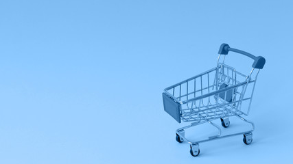 Supermarket trolley, shopping concept, Panton 2020 colour, classic blue