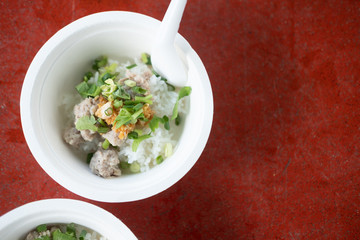 Close up a boiled rice with minced pork