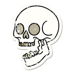 traditional distressed sticker tattoo of a skull