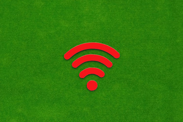 The Wi-Fi sign is red on a green background. The Internet.