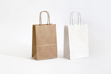 brown and white eco paper bag