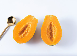 Hawaii papaya slice half on white background