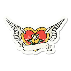 traditional distressed sticker tattoo of a flying heart with flowers and banner