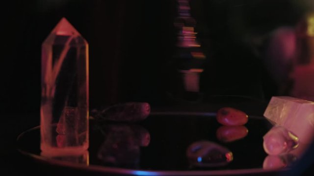 Extreme close up of fortune spelling with pendulum